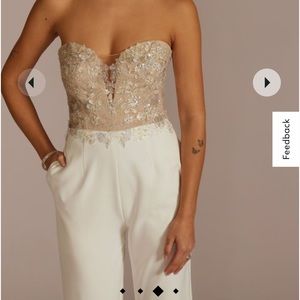 Brand new (with tags) David’s Bridal Jumpsuit
Never worn. Size 18, color ivory